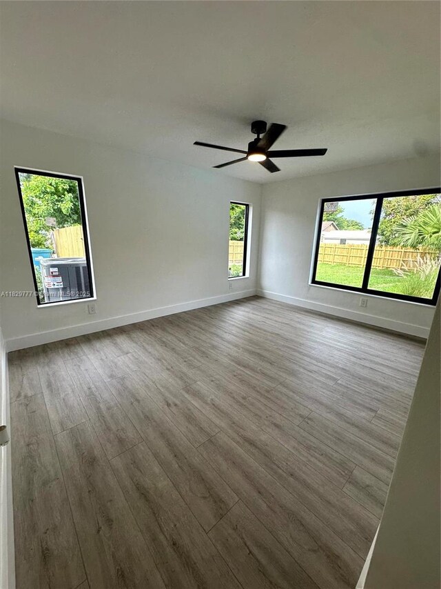 17902 SW 87th Pl, Palmetto Bay, FL 33157 - unfurnished room featuring wood finished floors and ceiling fan