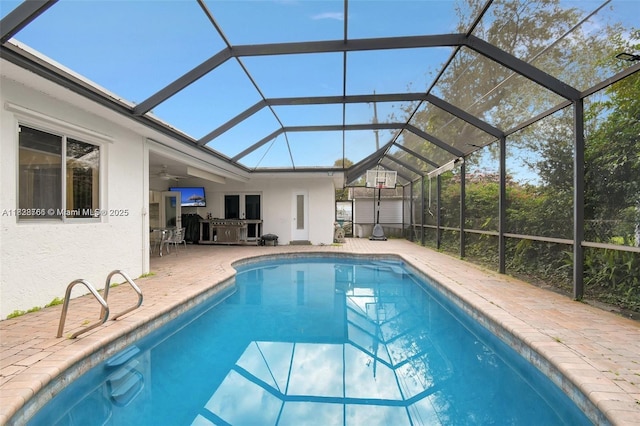 1840 N 56th Ave, Hollywood, FL 33021 - outdoor pool featuring a patio, glass enclosure, and ceiling fan