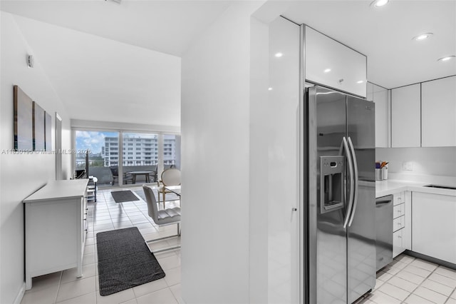 177 Ocean Lane Dr Unit 1203, Key Biscayne, FL 33149 - kitchen featuring appliances with stainless steel finishes, white cabinetry, light countertops, and recessed lighting