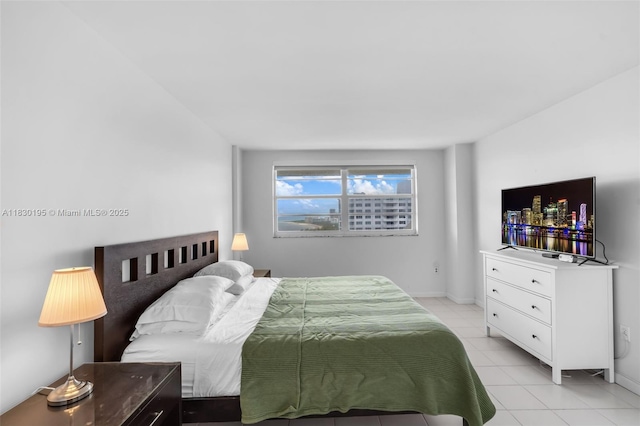 177 Ocean Lane Dr Unit 1203, Key Biscayne, FL 33149 - bedroom featuring light tile patterned flooring and baseboards