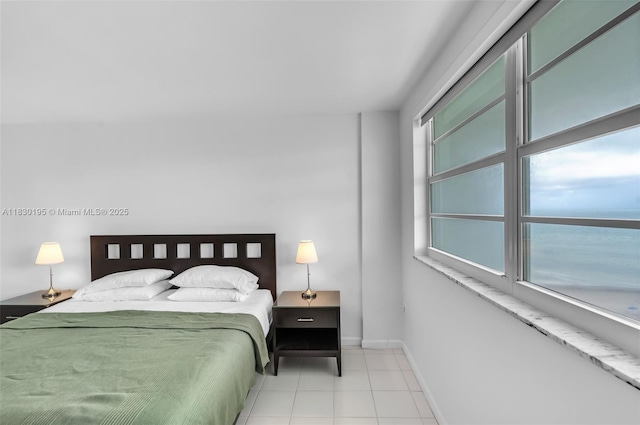177 Ocean Lane Dr Unit 1203, Key Biscayne, FL 33149 - tiled bedroom with multiple windows and a water view