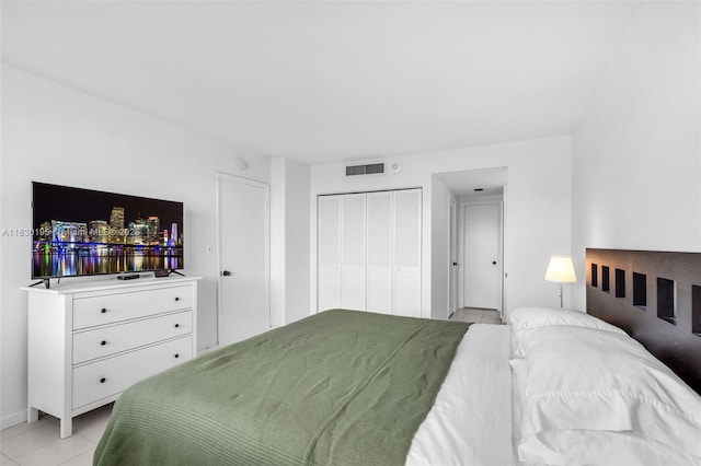 177 Ocean Lane Dr Unit 1203, Key Biscayne, FL 33149 - bedroom with light tile patterned flooring and a closet