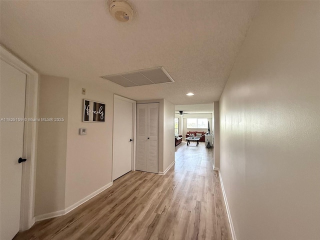 1400 SW 137th Ave Unit 411F, Pembroke Pines, FL 33027 - hall featuring light wood-type flooring and attic access