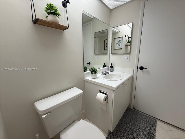 1400 SW 137th Ave Unit 411F, Pembroke Pines, FL 33027 - half bathroom with vanity and tile patterned floors