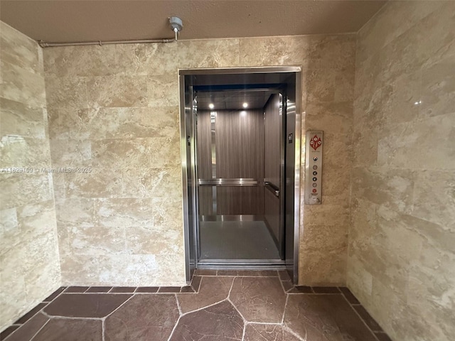 1400 SW 137th Ave Unit 411F, Pembroke Pines, FL 33027 - view of exterior entry with elevator