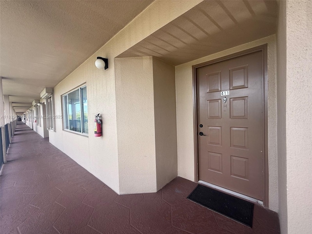 1400 SW 137th Ave Unit 411F, Pembroke Pines, FL 33027 - doorway to property with stucco siding