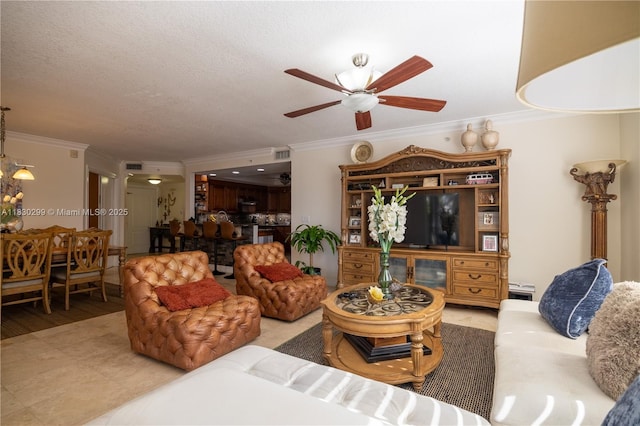 9 NE 20th Ave Unit 201, Deerfield Beach, FL 33441 - living room with ornamental molding and ceiling fan