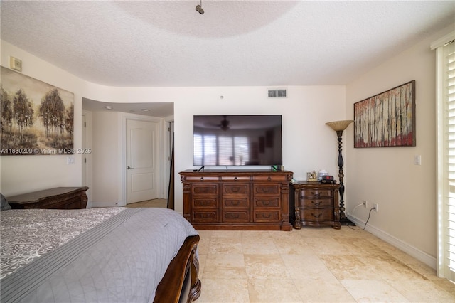 9 NE 20th Ave Unit 201, Deerfield Beach, FL 33441 - bedroom featuring a textured ceiling