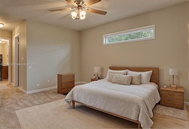 3574 SW Masilunas St, Port St Lucie, FL 34953 - bedroom with a ceiling fan and light colored carpet