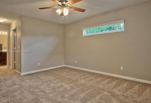 3574 SW Masilunas St, Port St Lucie, FL 34953 - unfurnished room with light carpet, a ceiling fan, and a textured ceiling