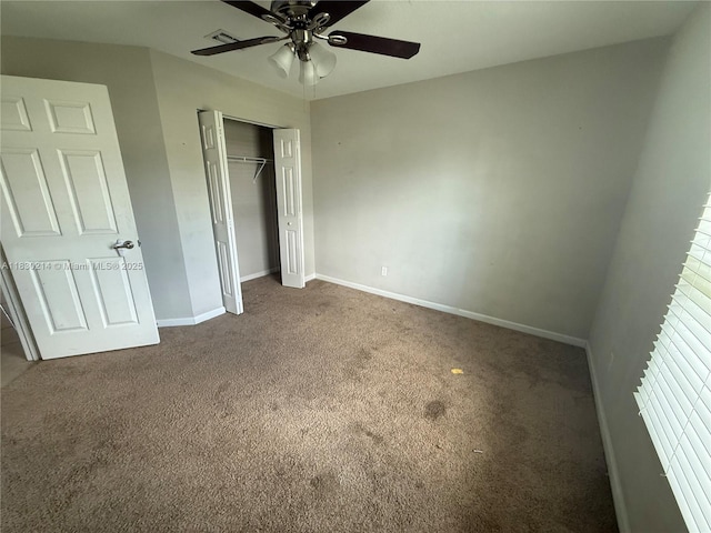 3574 SW Masilunas St, Port St Lucie, FL 34953 - unfurnished bedroom featuring carpet, a closet, and a ceiling fan