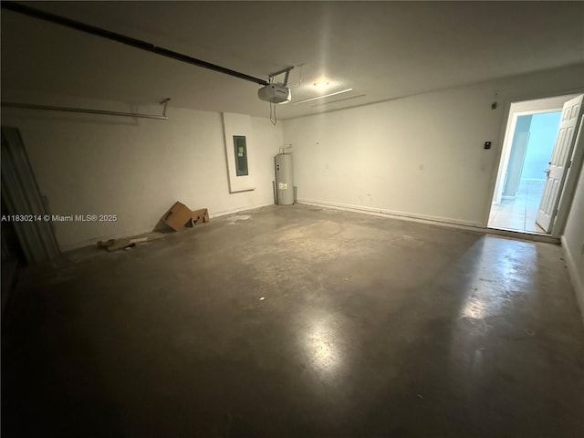 3574 SW Masilunas St, Port St Lucie, FL 34953 - garage featuring water heater, electric panel, and a garage door opener