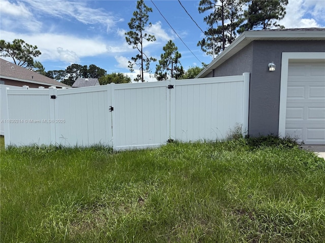 3574 SW Masilunas St, Port St Lucie, FL 34953 - view of yard featuring a garage