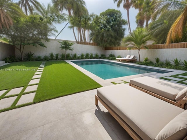 3574 SW Masilunas St, Port St Lucie, FL 34953 - view of swimming pool with a fenced backyard and a patio area