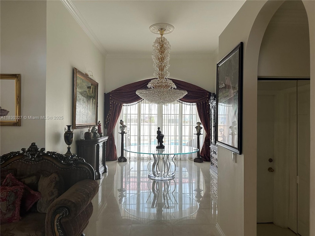16021 NW 83rd Ave, Miami Lakes, FL 33016 - corridor featuring a chandelier, ornamental molding, and tile patterned flooring