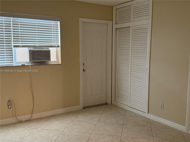 3500 Harrison St Unit 10, Hollywood, FL 33021 - entryway with light tile patterned flooring and cooling unit