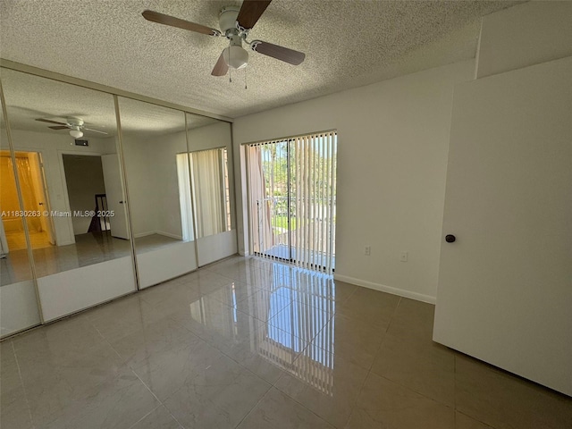 719 Mill Valley Pl, West Palm Beach, FL 33409 - unfurnished room with a ceiling fan and a textured ceiling