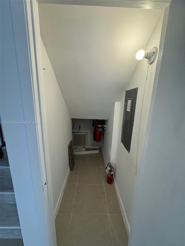 719 Mill Valley Pl, West Palm Beach, FL 33409 - hall with electric panel and tile patterned flooring