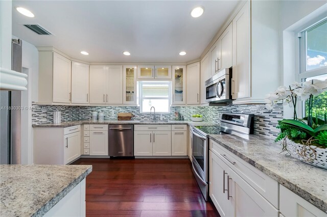 431 Gerona Ave, Coral Gables, FL 33146 - unfurnished bedroom featuring light wood-style floors and baseboards