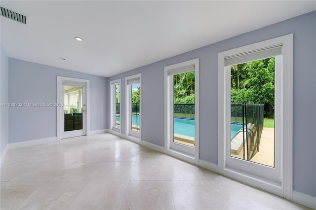 431 Gerona Ave, Coral Gables, FL 33146 - unfurnished room featuring baseboards and light tile patterned floors