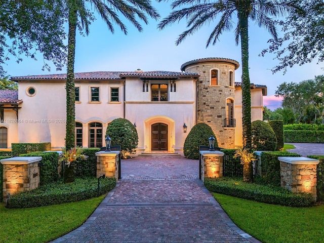 10101 SW 60th Ct, Pinecrest, FL 33156 - mediterranean / spanish home featuring stucco siding, french doors, and a tile roof