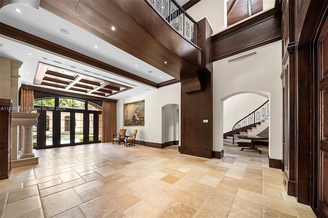10101 SW 60th Ct, Pinecrest, FL 33156 - common area with coffered ceiling, stairway, recessed lighting, a high ceiling, and beam ceiling