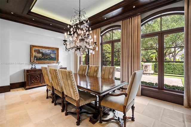 10101 SW 60th Ct, Pinecrest, FL 33156 - dining area with a chandelier and a tray ceiling