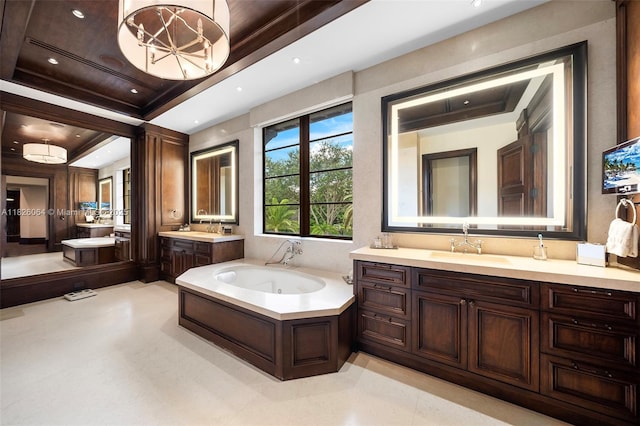10101 SW 60th Ct, Pinecrest, FL 33156 - bathroom with two vanities and a jetted tub