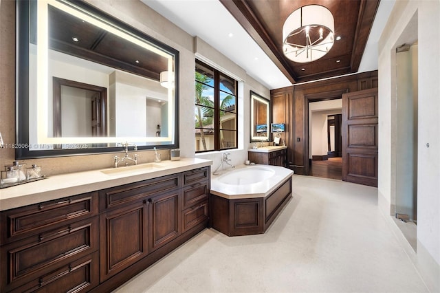 10101 SW 60th Ct, Pinecrest, FL 33156 - full bathroom with vanity, a garden tub, recessed lighting, and a raised ceiling