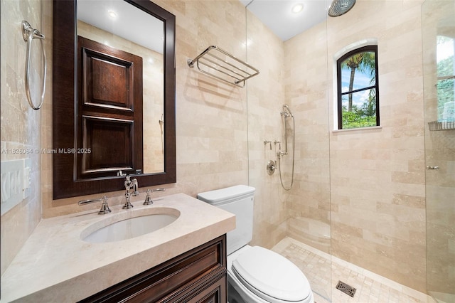 10101 SW 60th Ct, Pinecrest, FL 33156 - full bath with a tile shower, vanity, and tile walls