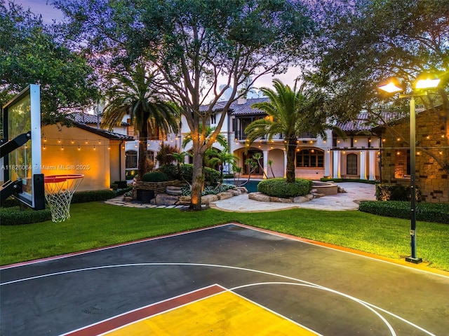 10101 SW 60th Ct, Pinecrest, FL 33156 - view of basketball court with a yard