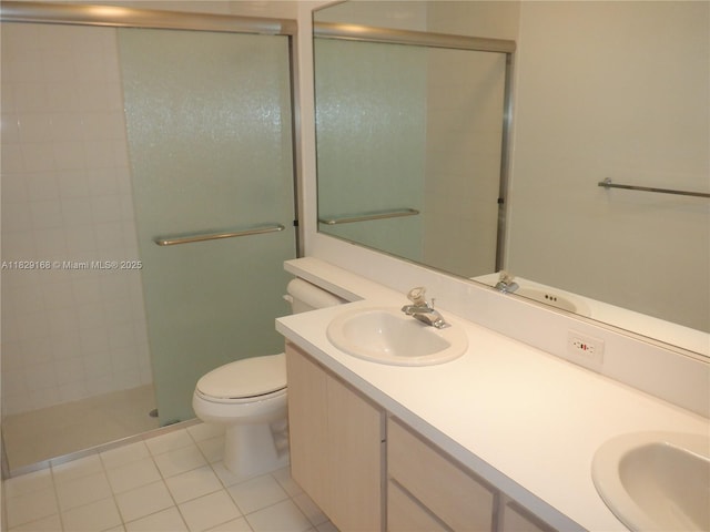 5103 Water Oak Ct, Palm Beach Gardens, FL 33410 - full bathroom featuring double vanity, a stall shower, and tile patterned flooring