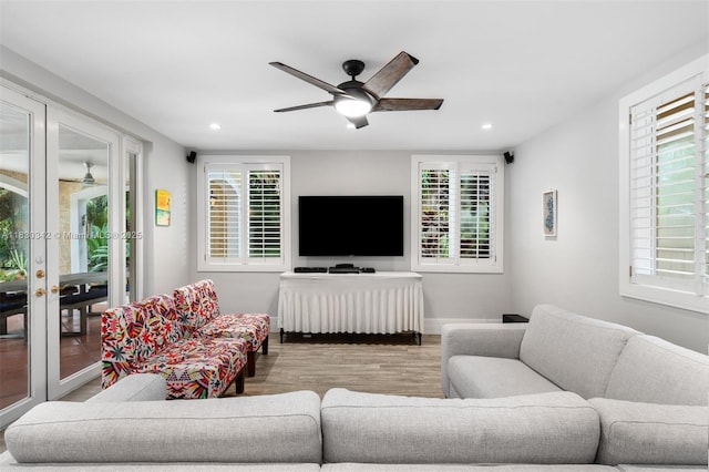 11401 SW 69th Ave, Pinecrest, FL 33156 - living area with a ceiling fan, wood finished floors, recessed lighting, and healthy amount of natural light