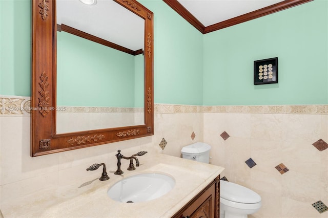 11401 SW 69th Ave, Pinecrest, FL 33156 - half bathroom with crown molding, tile walls, vanity, and wainscoting