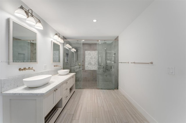 11401 SW 69th Ave, Pinecrest, FL 33156 - full bathroom featuring double vanity, a stall shower, and wood tiled floors