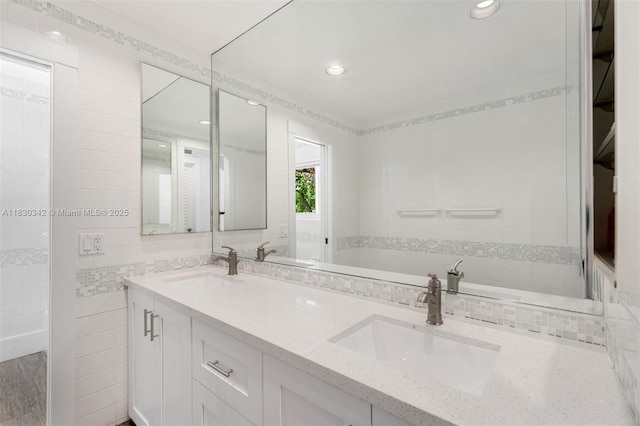 11401 SW 69th Ave, Pinecrest, FL 33156 - bathroom with double vanity, tile walls, and recessed lighting