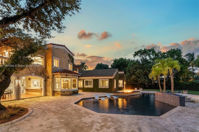 11401 SW 69th Ave, Pinecrest, FL 33156 - swimming pool with a patio area