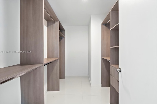851 NE 1st Ave Unit 3201, Miami, FL 33132 - spacious closet featuring light tile patterned floors