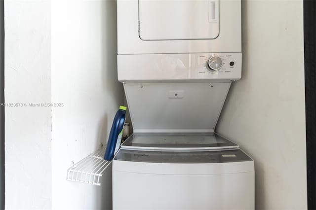 701 SW 141st Ave Unit 406R, Pembroke Pines, FL 33027 - laundry room with stacked washer / dryer