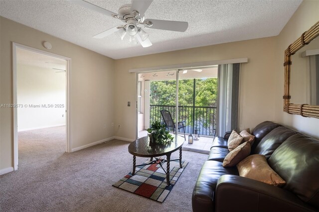 701 SW 141st Ave Unit 406R, Pembroke Pines, FL 33027 - carpeted living area featuring ceiling fan and a textured ceiling