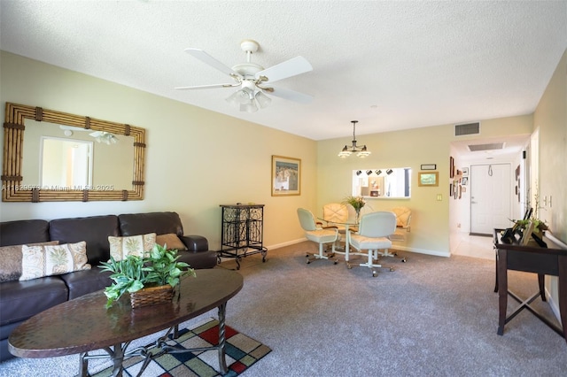 701 SW 141st Ave Unit 406R, Pembroke Pines, FL 33027 - carpeted living area with a ceiling fan, a chandelier, and a textured ceiling