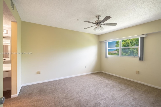 701 SW 141st Ave Unit 406R, Pembroke Pines, FL 33027 - carpeted spare room featuring a textured ceiling and ceiling fan