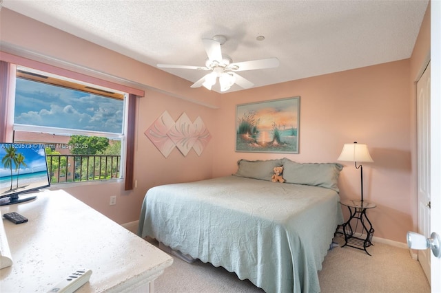 701 SW 141st Ave Unit 406R, Pembroke Pines, FL 33027 - carpeted bedroom with ceiling fan and a textured ceiling