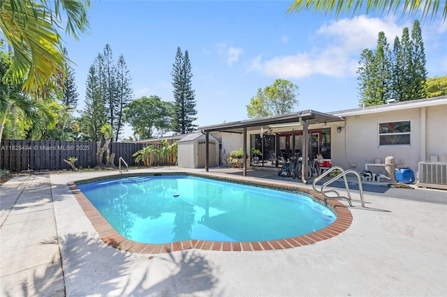4960 SW 5th St, Margate, FL 33068 - view of swimming pool featuring a patio, a shed, a fenced backyard, and ceiling fan
