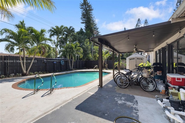 4960 SW 5th St, Margate, FL 33068 - view of pool featuring a storage shed, a fenced backyard, and a patio area