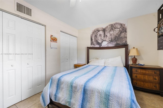 4960 SW 5th St, Margate, FL 33068 - tiled bedroom featuring multiple closets and ceiling fan