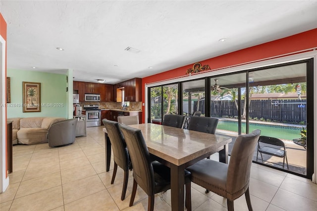 4960 SW 5th St, Margate, FL 33068 - dining area featuring light tile patterned floors and recessed lighting