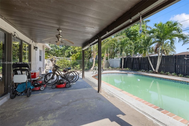 4960 SW 5th St, Margate, FL 33068 - view of swimming pool with a fenced backyard, ceiling fan, and a patio