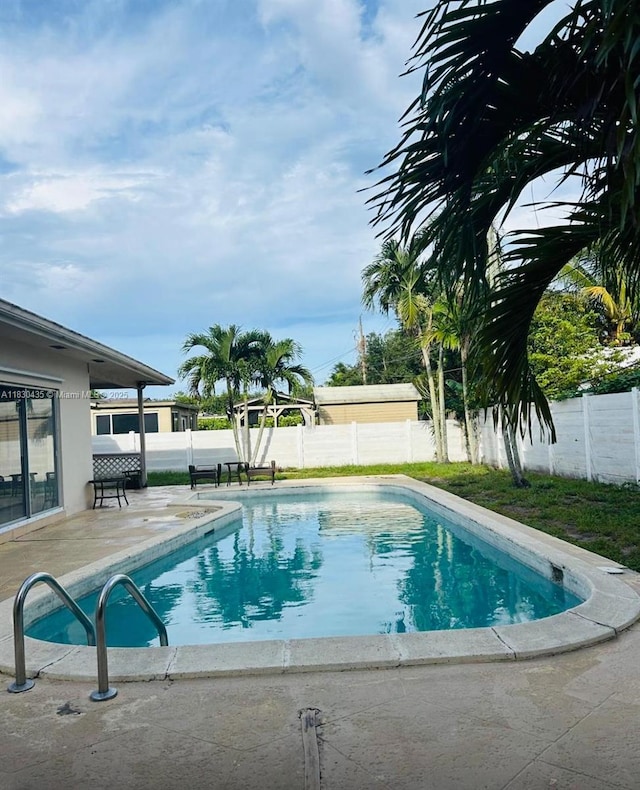 6790 SW 10th Ct, Pembroke Pines, FL 33023 - view of pool featuring a fenced backyard and a patio