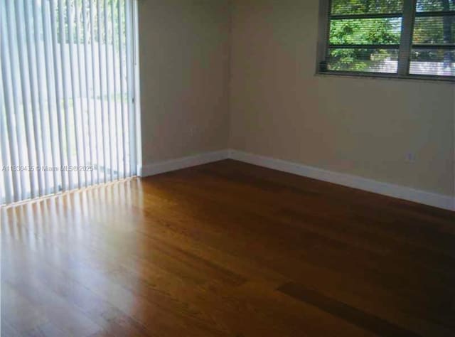 6790 SW 10th Ct, Pembroke Pines, FL 33023 - empty room featuring wood finished floors